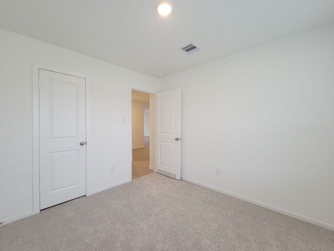 Building Photo - This lovely single-level home showcases a spacious open floorplan shared between the kitchen, din...