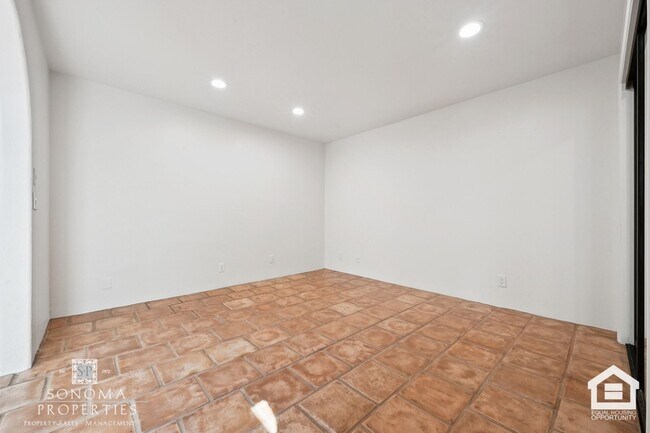 Building Photo - Southwestern Charm Meets Modern Comfort — 2BR/2BA Condo with Access to Shared Pool!