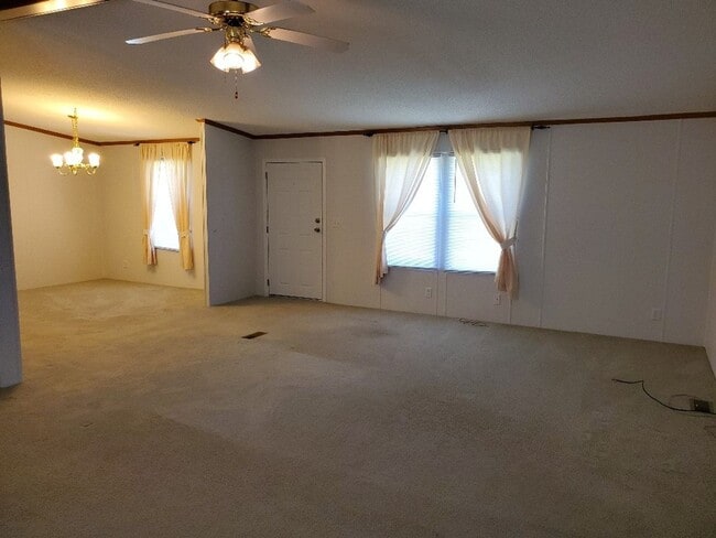 Building Photo - Charm & Commuter Convenience – 3BR/2BA Outside City Limits