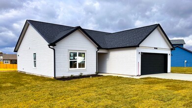 Building Photo - Open-Concept Home with Modern Upgrades Featuring Hardwood Flooring and Open Kitchen