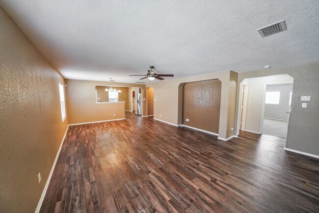 Building Photo - Energy-Smart Single-Story Now Available in...