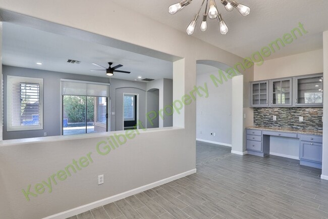 Building Photo - Spacious 4-Bedroom Home with Pool in Gilbe...