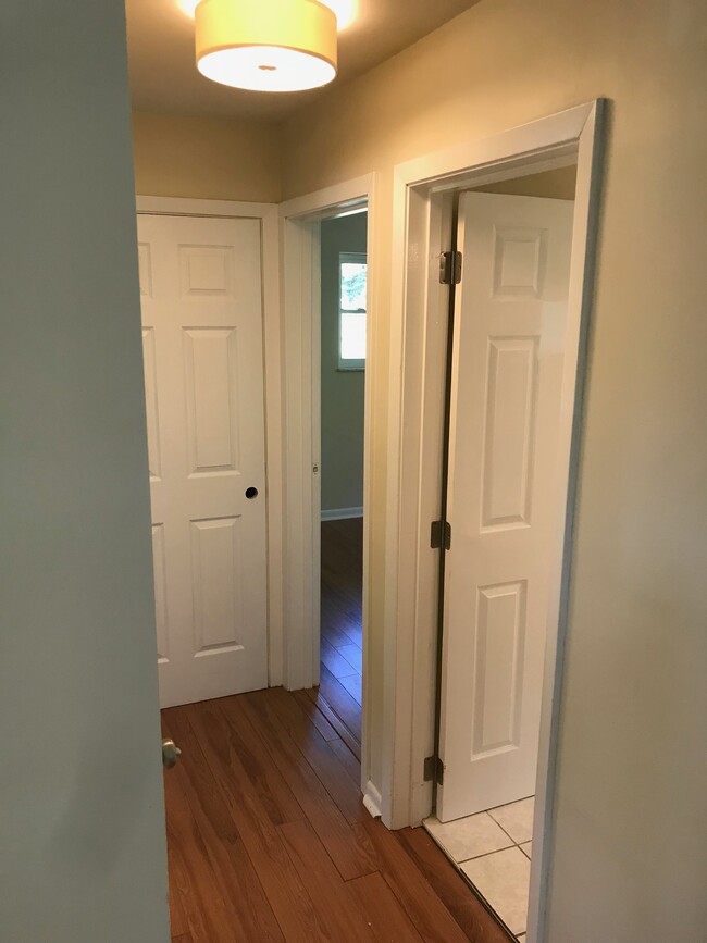 Hallway - Closet straight ahead. Bath 1st door on right. Bedroom 2 second door on right - 614 Perimeter Drive