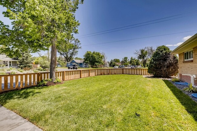 Building Photo - 9875 E 22nd Ave