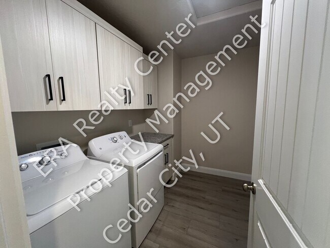 Building Photo - 3 Bed - 2.5 Bath, New Construction, Large Condo - 2 Car Garage