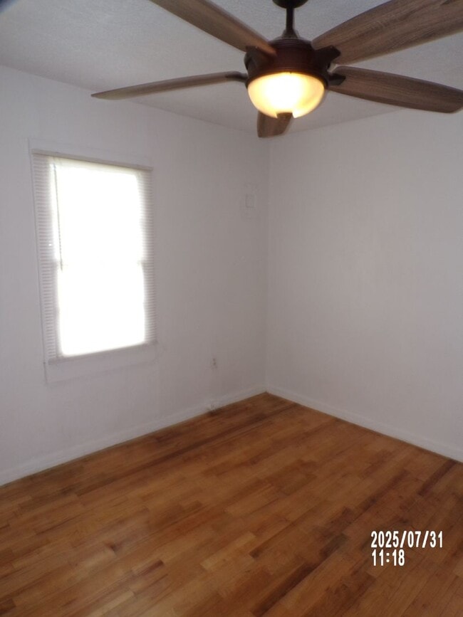 Building Photo - NEW listing-refinished hardwood floors, new laminate and paint throughout