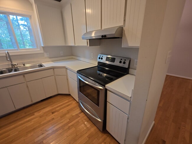 Building Photo - Terrific Rancher with Vaulted Ceiling in Meredith Woods.