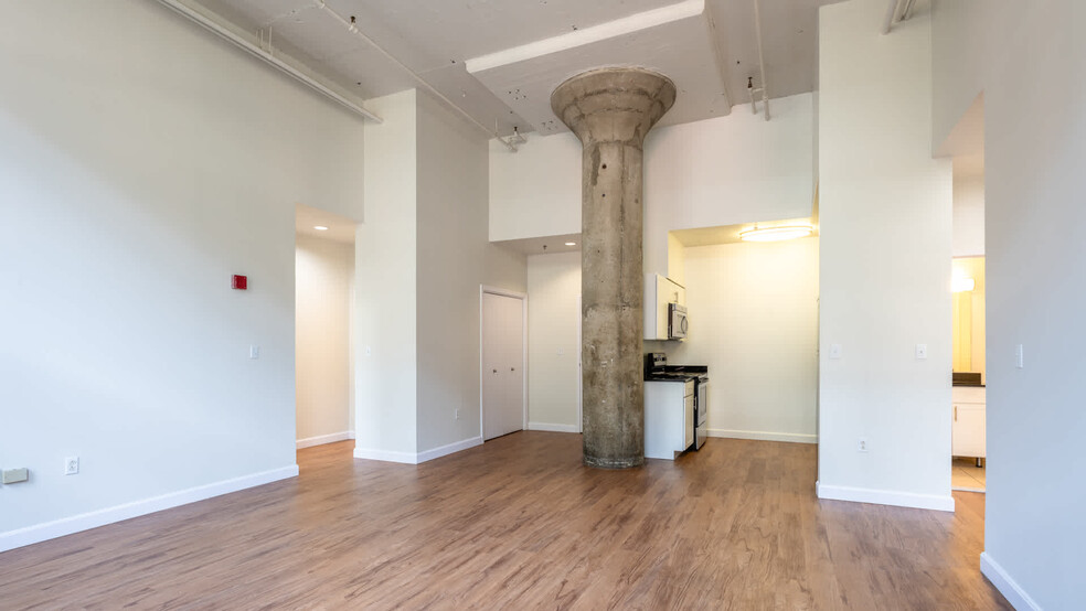 Living Room with Hard Surface Flooring - Lofts at Kendall Square