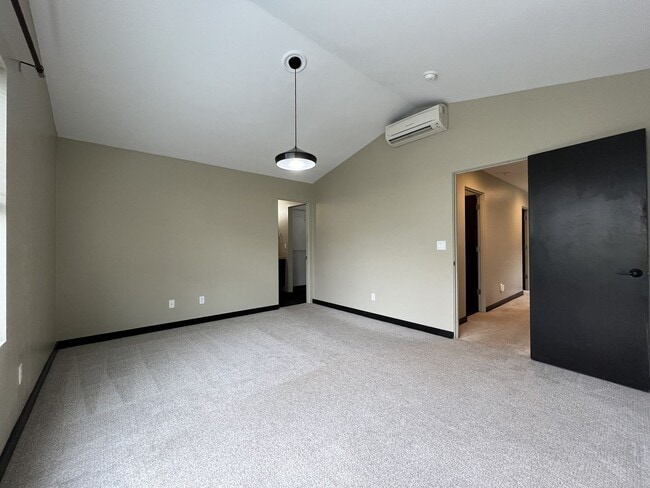 Building Photo - Charming 3 Bedroom, 2.5 Bathroom Home with Large Living Room, Tall Windows, Island Kitchen, and A...