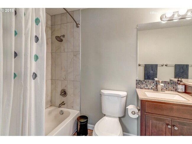 Building Photo - Spacious 4-Bedroom Home with Multiple Livi...