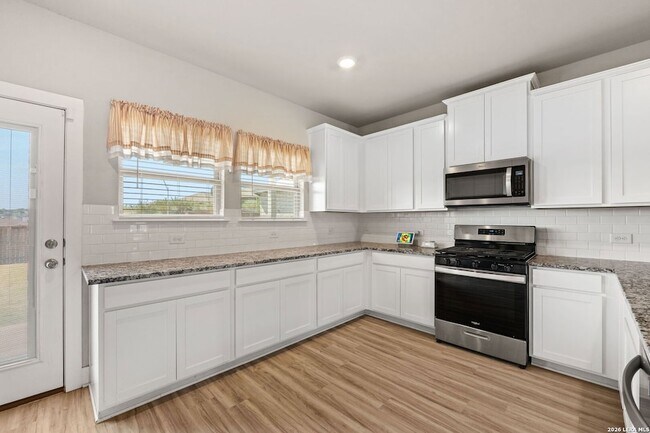 Building Photo - 6410 Comanche Sky