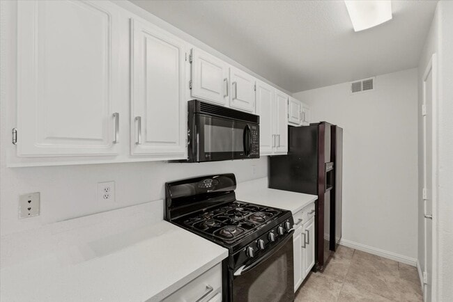 Building Photo - 5125 W Reno Ave