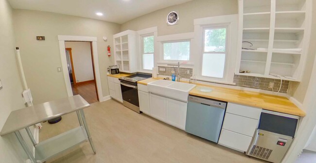 Primary Photo - Two Updated Kitchens + Waterfall Shower + ...