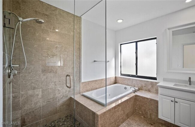 Building Photo - 7056 Pelican Bay Blvd