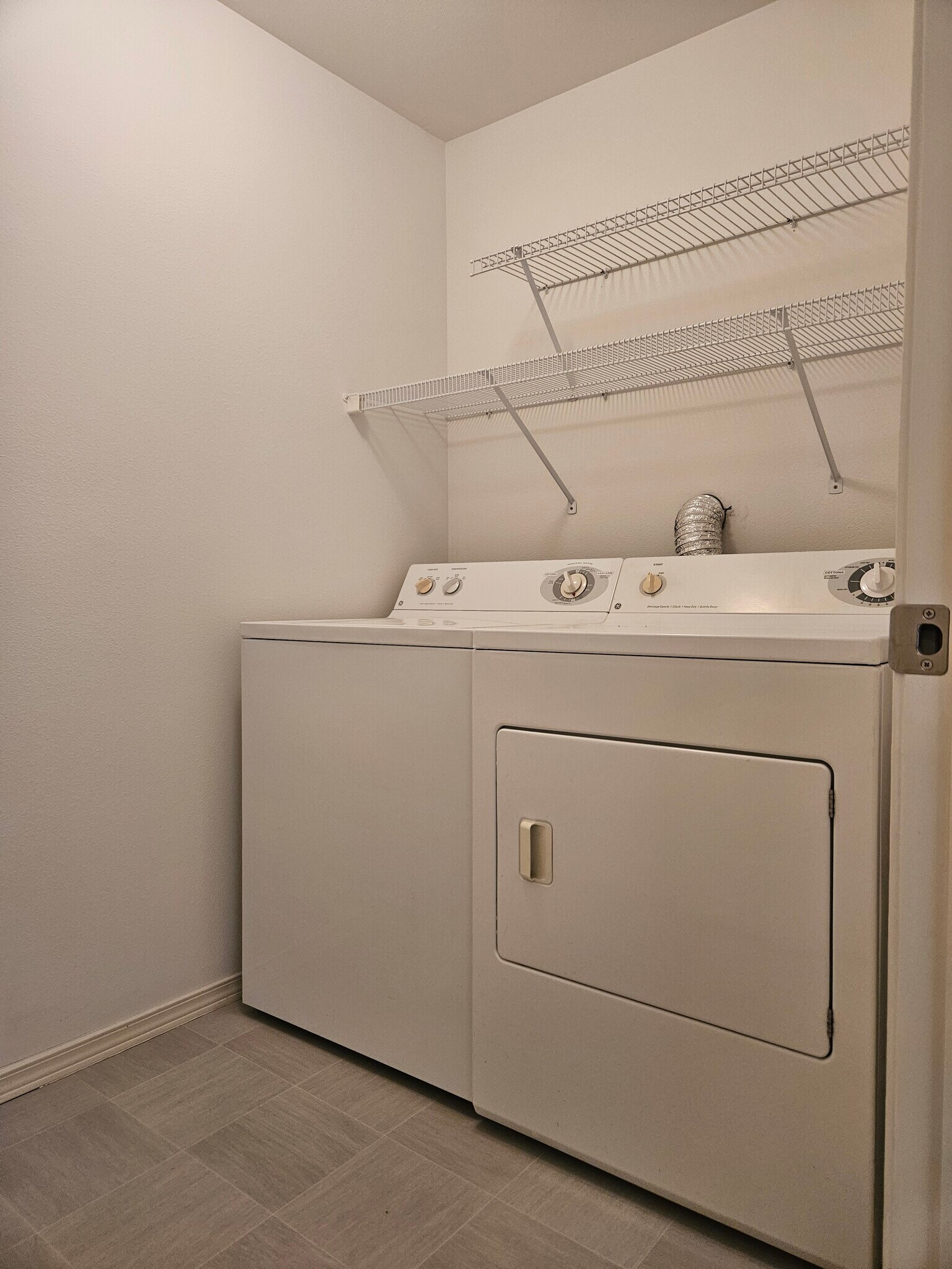 Separate laundry room with full size washer and dryer - 18621 Blueberry Ln
