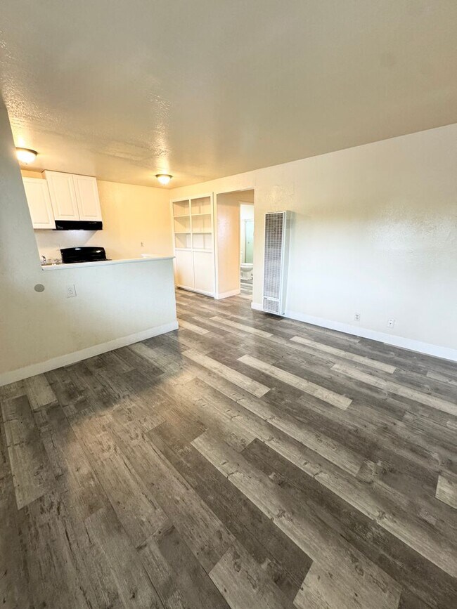 Building Photo - Move-In Special; Downstairs One Bedroom + Private Patio – Available Now! SEE VIDEO