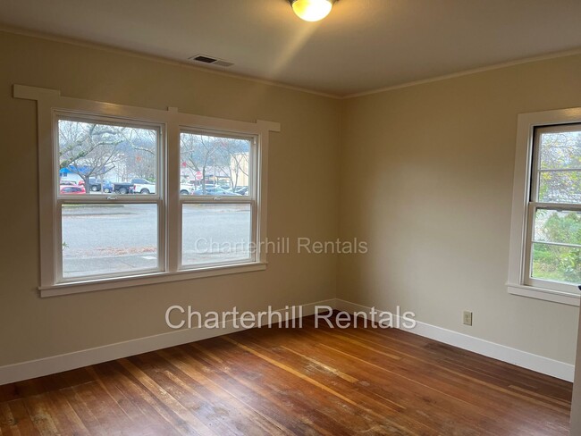 Building Photo - Spacious home with large yard convenient t...