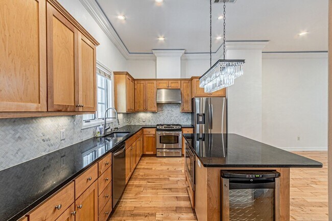 Building Photo - Coming Soon! | 2 Bedroom + Office Townhouse | Private Rooftop Deck | Prime Uptown Location