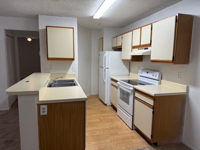 Building Photo - LANDING 2-BEDROOM CONDO