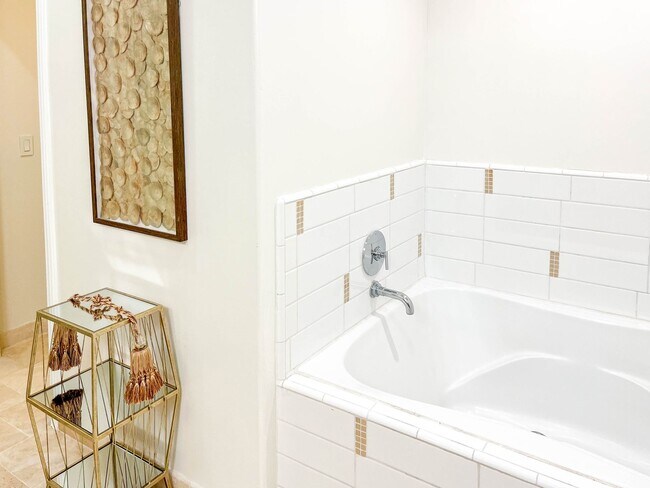 Building Photo - Experience Elevated Living at The American...
