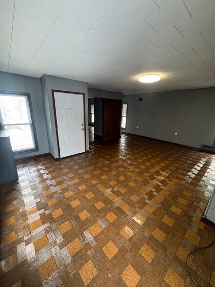 Living room with apartment entrance - 109 Plymouth Ave