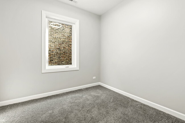 Building Photo - 4605 S Langley Ave