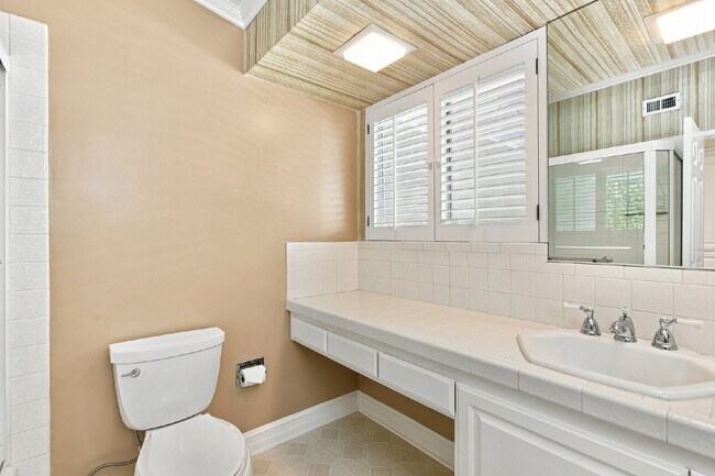 Building Photo - Coveted and Spacious Rossmoor 3-bed/2-bath Home with Expansive Entertainer’s Backyard