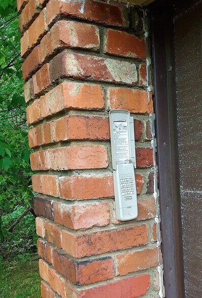 Key pad garage entrance - 3305 W Run Rd