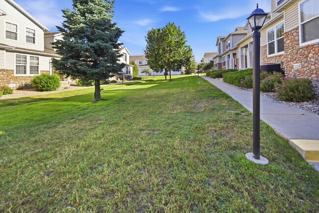 Building Photo - $1,945.95 - 2 Bed, 2.5 Bath Townhome in Colorado Springs with Attached Garage!