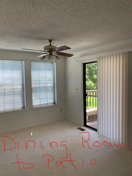 Slider door to out door patio, through dining area - 5341 76th W Ave