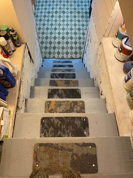 Stairs to communal laundry room - 1524 W Dean Ave