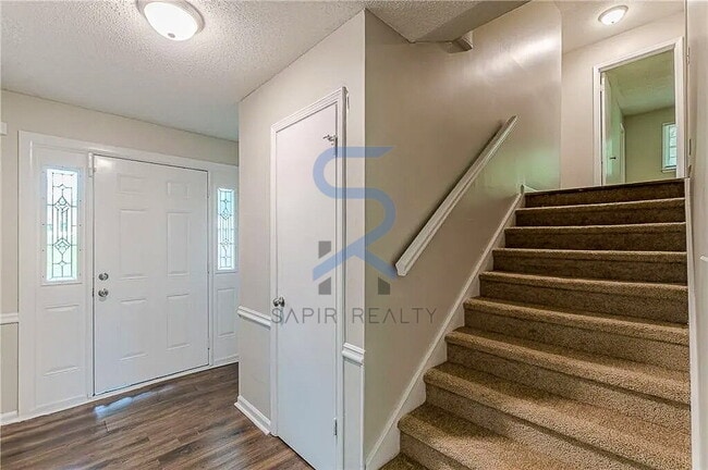 Building Photo - LIMITED-TIME OFFER!  Apply today with NO APPLICATION FEE! Terms apply. Call (678) 487-7896, Optio...