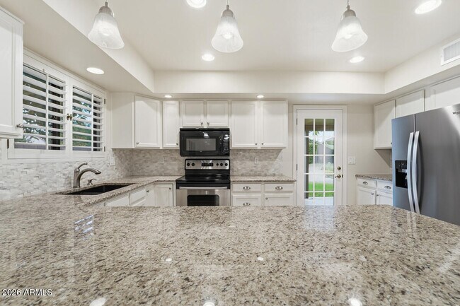 Building Photo - 5720 E Le Marche Ave