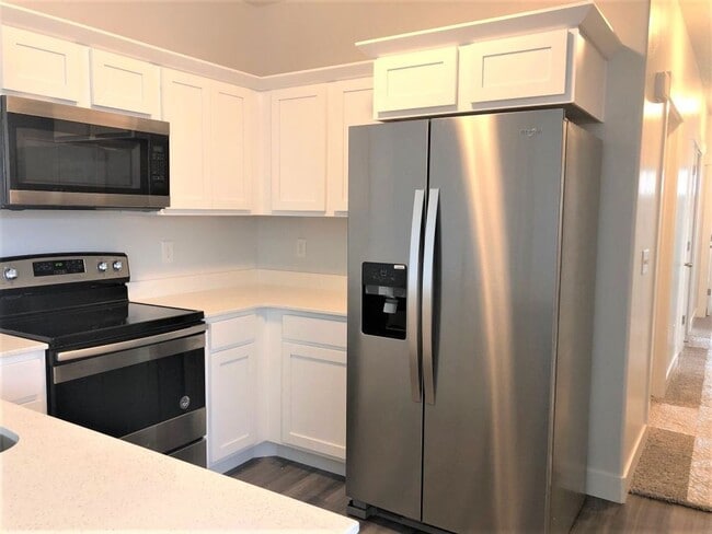 Building Photo - Top-Floor South-Facing Condo in Quail Hill...