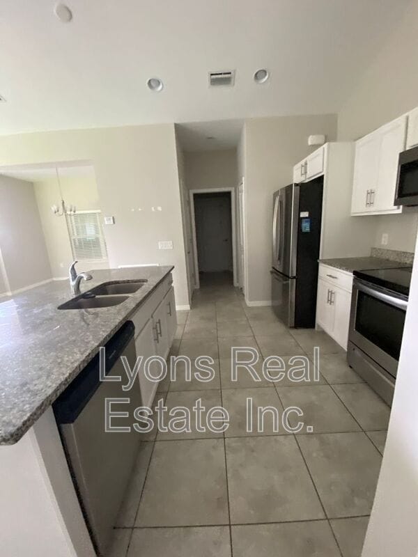 Building Photo - 18463 Van Nuys Cir