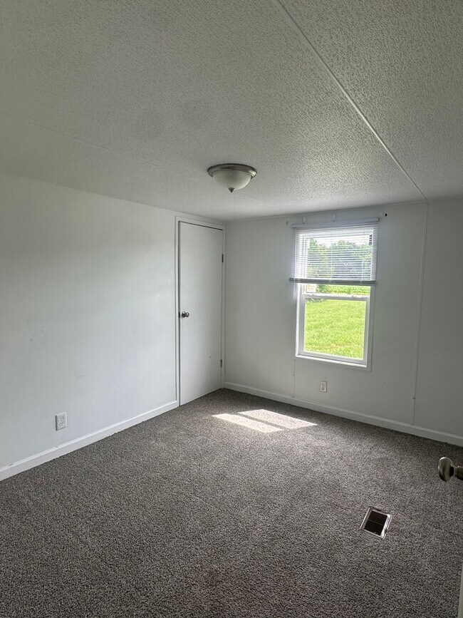 Building Photo - 6245 Speights Chapel Rd