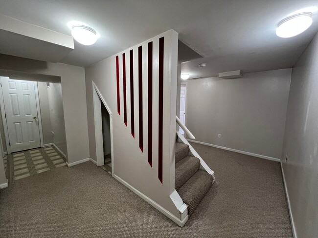 Building Photo - Steps from Kansas State University! Spacious 4-Bedroom Duplex