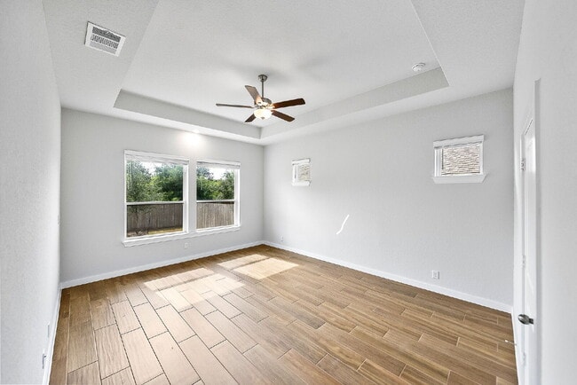 Building Photo - Greenbelt. 3 Car Garage. Built In Dog Room.