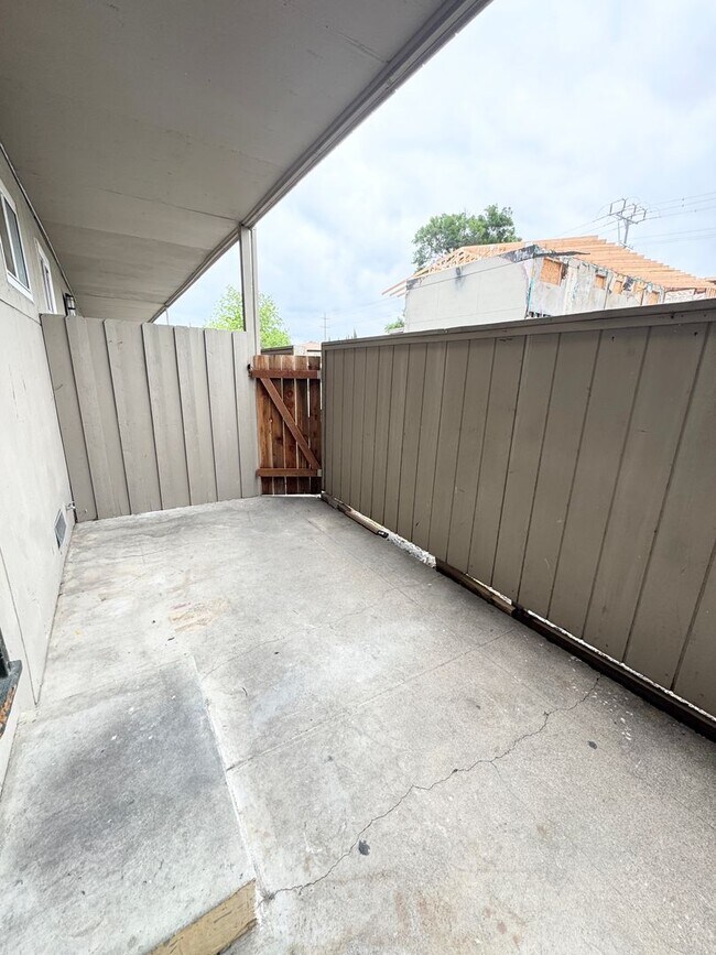 Building Photo - Move-In Special; Downstairs One Bedroom + Private Patio – Available Now! SEE VIDEO