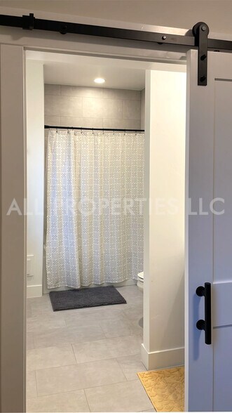 Building Photo - 8059 W 52nd Dr