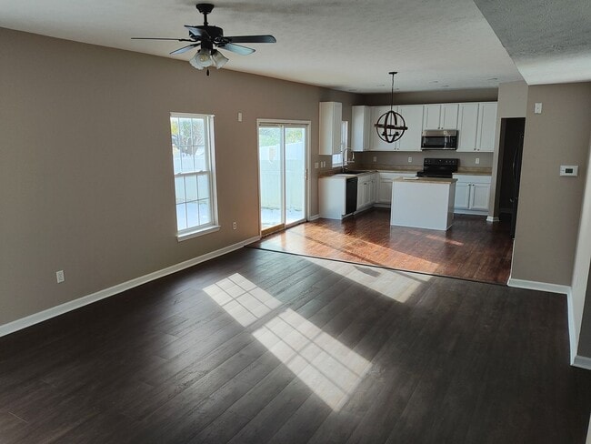 Building Photo - Beautifully maintained 4-bedroom, 2.5-bath over 2,200 sqft with a 2 car garage!