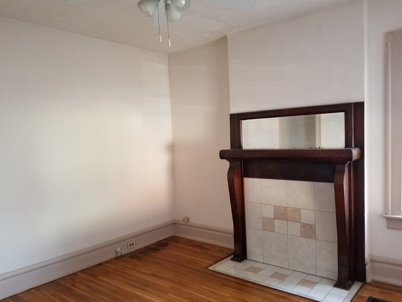 Faux Fireplace in Living Room - 143 W 1st Ave