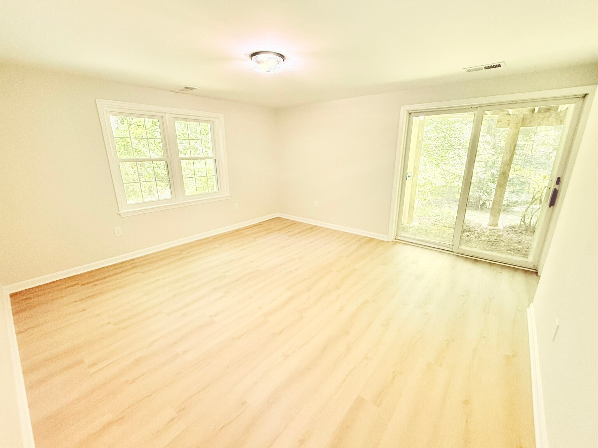 Basement bedroom 1 with yard access - 9248 Wood Glade Dr