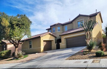 Building Photo - 4 Bedroom Home and 3 full bathrooms  with ...