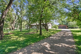 Building Photo - Rent in Andover 4 bd 3 ba 5 garage stalls,...