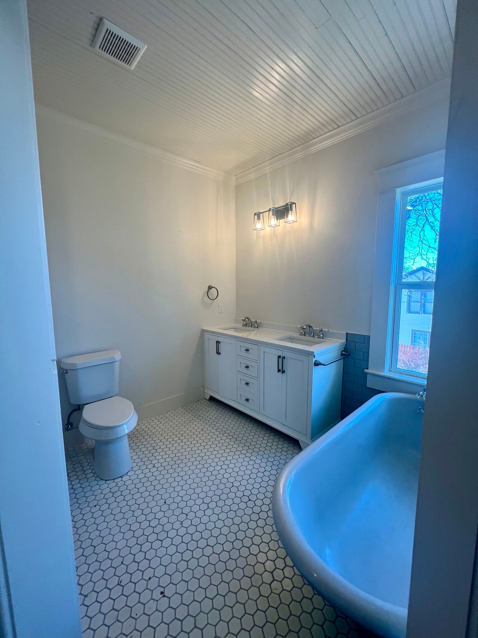Master bath with claw foot tub and separate shower - 2115 Johnson St
