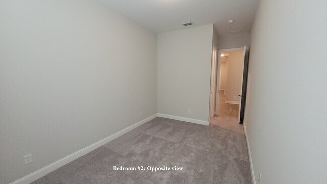 Building Photo - End-unit townhome with plenty of extra windows! Gated Community.