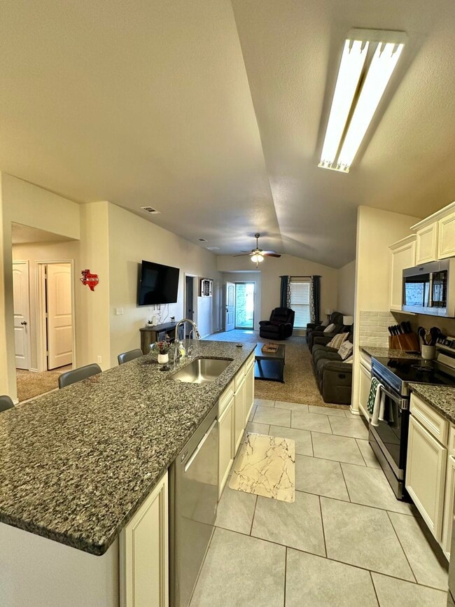 Building Photo - 10411 Valencia Ave