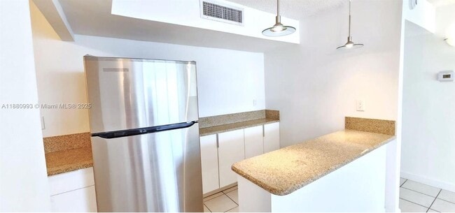 Building Photo - 7135 Collins Ave