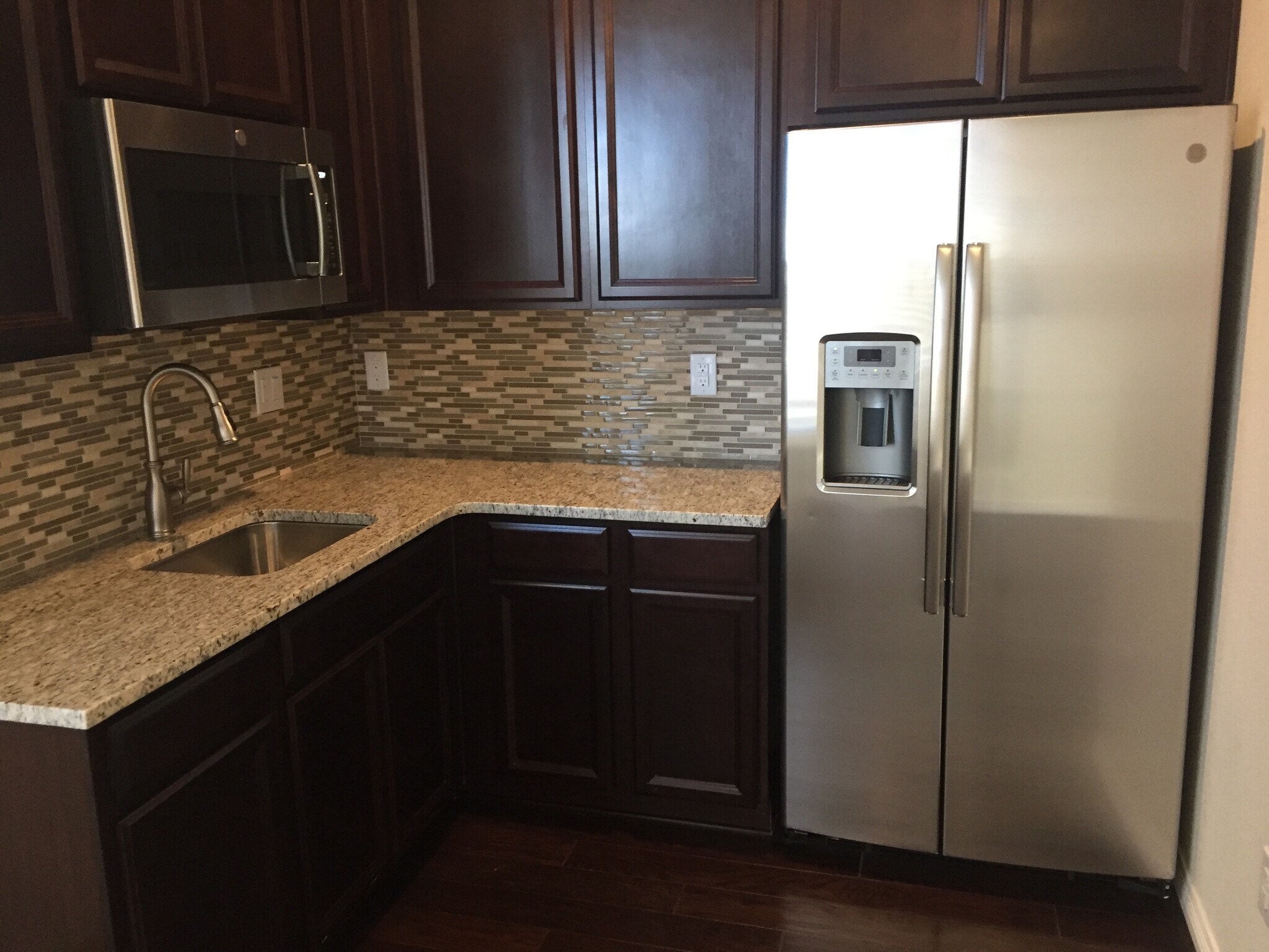 Kitchen with granite countertop - 14775 Chicago Street (Suite)